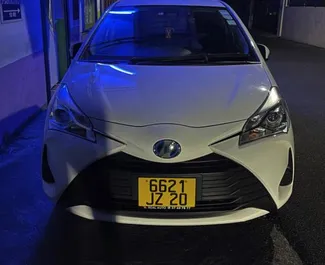 Front view of a rental Toyota Vitz in Mauritius, Mauritius ✓ Car #7816. ✓ Automatic TM ✓ 0 reviews.