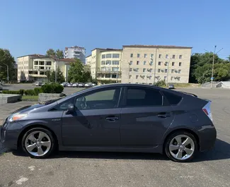 Hybrid 1.8L engine of Toyota Prius 2012 for rental in Kutaisi.