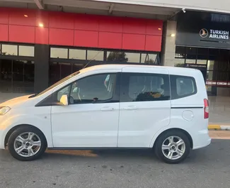 Front view of a rental Ford Courier at Bodrum Airport, Turkey ✓ Car #7884. ✓ Manual TM ✓ 0 reviews.