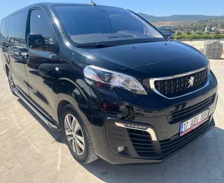 Front view of a rental Peugeot Expert Traveller at Bodrum Airport, Turkey ✓ Car #7883. ✓ Automatic TM ✓ 0 reviews.