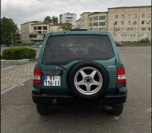 Car Hire Mitsubishi Pajero Io #7748 Automatic in Kutaisi, equipped with 1.8L engine ➤ From Dima in Georgia.