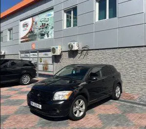 Front view of a rental Dodge Caliber in Tbilisi, Georgia ✓ Car #7737. ✓ Automatic TM ✓ 0 reviews.