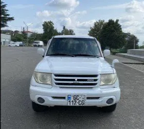 Front view of a rental Mitsubishi Pajero Io in Kutaisi, Georgia ✓ Car #7774. ✓ Automatic TM ✓ 0 reviews.