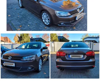 Front view of a rental Volkswagen Jetta at Tirana airport, Albania ✓ Car #7685. ✓ Automatic TM ✓ 0 reviews.