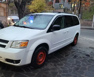 Front view of a rental Dodge Grand Caravan in Tbilisi, Georgia ✓ Car #8082. ✓ Automatic TM ✓ 0 reviews.