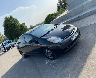 Front view of a rental Toyota Prius in Kutaisi, Georgia ✓ Car #7773. ✓ Automatic TM ✓ 0 reviews.