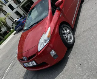 Front view of a rental Toyota Prius in Kutaisi, Georgia ✓ Car #7745. ✓ Automatic TM ✓ 0 reviews.