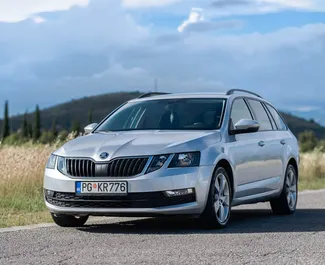 Frontvisning av en leiebil Skoda Octavia Combi i Podgorica, Montenegro ✓ Bil #4707. ✓ Automatisk TM ✓ 5 anmeldelser.