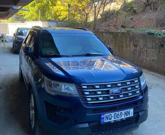 Vista frontal de un Ford Explorer de alquiler en Tiflis, Georgia ✓ Coche n.º 8026. ✓ Automático TM ✓ 0 opiniones.