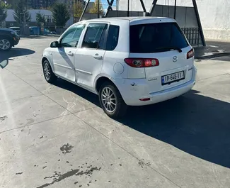 Mazda Demio 2003 automobilio nuoma Gruzijoje, savybės ✓ Benzinas degalai ir  arklio galios ➤ Nuo 60 GEL per dieną.