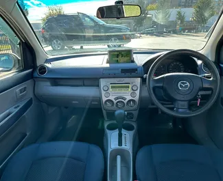 Mazda Demio 2003 disponível para alugar em Tbilisi, com limite de quilometragem de ilimitado.