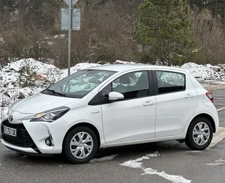 Toyota Yaris 2020 car hire in Montenegro, featuring ✓ Hybrid fuel and 75 horsepower ➤ Starting from 22 EUR per day.