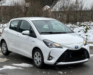 Front view of a rental Toyota Yaris in Becici, Montenegro ✓ Car #8135. ✓ Automatic TM ✓ 0 reviews.