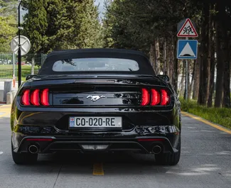 Ford Mustang Cabrio 2018 için kiralık Benzin 2,3L motor, Tiflis'te.