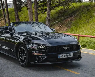 Ford Mustang Cabrio 2018 araç kiralama Gürcistan'da, ✓ Benzin yakıt ve 310 beygir gücü özellikleriyle ➤ Günde başlayan fiyatlarla 233 GEL.