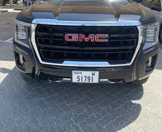 GMC Yukon 2021 car hire in the UAE, featuring ✓ Petrol fuel and 460 horsepower ➤ Starting from 789 AED per day.