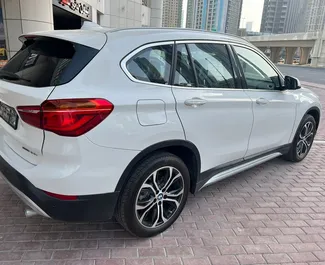 Front view of a rental BMW X1 in Dubai, UAE ✓ Car #4943. ✓ Automatic TM ✓ 0 reviews.