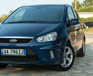 Predný pohľad na prenajaté auto Ford C-Max v v meste Durres, Albánsko ✓ Auto č. 8211. ✓ Prevodovka Automatické TM ✓ Hodnotenia 0.