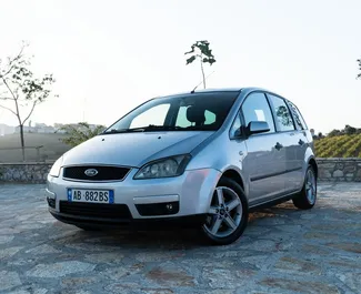 Vista frontal de um aluguel Ford C-Max em Durres, Albânia ✓ Carro #8212. ✓ Transmissão Automático TM ✓ 0 avaliações.