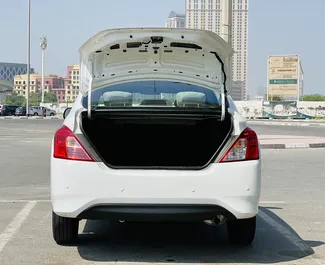 Nissan Sunny 2023 auton vuokraus Arabiemiirikunnissa, sisältää ✓ Bensiini polttoaineen ja 118 hevosvoimaa ➤ Alkaen 70 AED päivässä.
