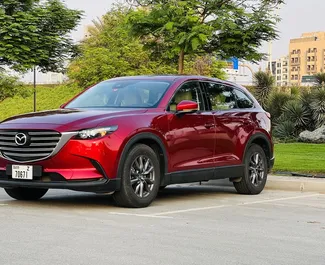 Framvy av en hyrbil Mazda Cx-9 i Dubai, Förenade Arabemiraten ✓ Bil #8298. ✓ Växellåda Automatisk TM ✓ 1 recensioner.