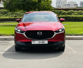 Sprednji pogled najetega avtomobila Mazda CX-30 v v Dubaju, ZAE ✓ Avtomobil #8316. ✓ Menjalnik Samodejno TM ✓ Mnenja 0.