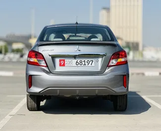 Mitsubishi Attrage 2023 car hire in the UAE, featuring ✓ Petrol fuel and 76 horsepower ➤ Starting from 60 AED per day.