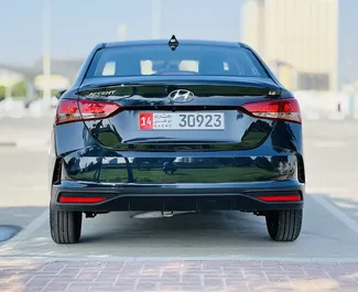 Hyundai Accent 2023 car hire in the UAE, featuring ✓ Petrol fuel and 123 horsepower ➤ Starting from 80 AED per day.