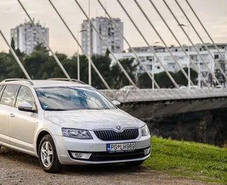 Front view of a rental Skoda Octavia Combi in Podgorica, Montenegro ✓ Car #7153. ✓ Automatic TM ✓ 0 reviews.