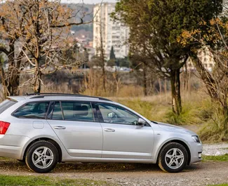 Skoda Octavia Combi rental. Comfort Car for Renting in Montenegro ✓ Deposit of 150 EUR ✓ TPL, CDW, SCDW, FDW, Theft, Abroad, Young insurance options.