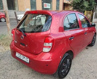 Front view of a rental Nissan Micra in Yerevan, Armenia ✓ Car #6772. ✓ Manual TM ✓ 0 reviews.