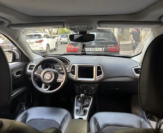 Petrol 2.4L engine of Jeep Compass 2019 for rental in Tbilisi.