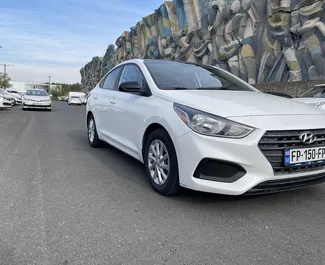 Hyundai Accent 2017 car hire in Georgia, featuring ✓ Petrol fuel and 130 horsepower ➤ Starting from 50 GEL per day.