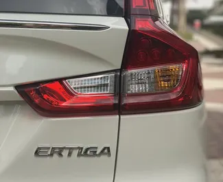 Petrol 1.6L engine of Suzuki Ertiga 2023 for rental in Dubai.