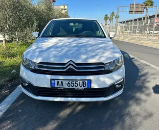 واجهة أمامية لسيارة إيجار Citroen C-Elysee في في تيرانا, ألبانيا ✓ رقم السيارة 8382. ✓ ناقل حركة يدوي ✓ تقييمات 0.