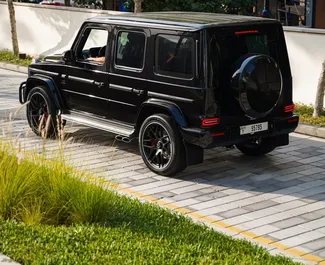 Прокат машины Mercedes-Benz G63 AMG №8399 (Автомат) в Дубае, с двигателем 4,0л. Бензин ➤ Напрямую от Кумар в ОАЭ.