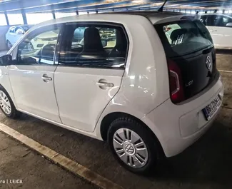 Interior of Volkswagen Up for hire in Serbia. A Great 5-seater car with a Manual transmission.