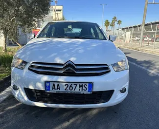 Vooraanzicht van een huurauto Citroen C-Elysee in Tirana, Albanië ✓ Auto #8378. ✓ Transmissie Handmatig TM ✓ 0 beoordelingen.