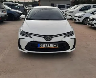 Front view of a rental Toyota Corolla Sedan at Antalya Airport, Turkey ✓ Car #8766. ✓ Automatic TM ✓ 1 reviews.