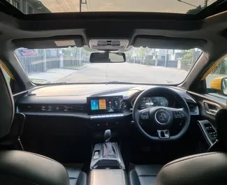 Interior do MG 5/GT para aluguer na Tailândia. Um excelente carro de 5 lugares com transmissão Automático.