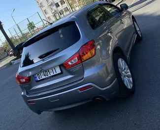 Mitsubishi Outlander Sport 2015 available for rent in Kutaisi, with unlimited mileage limit.