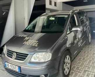 Front view of a rental Volkswagen Touran in Tirana, Albania ✓ Car #8628. ✓ Automatic TM ✓ 0 reviews.