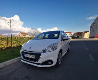 Front view of a rental Peugeot 208 in Podgorica, Montenegro ✓ Car #8791. ✓ Manual TM ✓ 0 reviews.