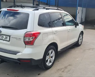 Petrol 2.5L engine of Subaru Forester 2014 for rental in Tbilisi.