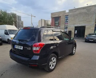 Petrol 2.5L engine of Subaru Forester 2014 for rental in Tbilisi.