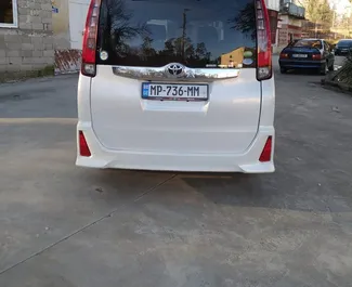 Interior of Toyota Noah for hire in Georgia. A Great 7-seater car with a Automatic transmission.