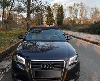 Predný pohľad na prenajaté auto Audi A3 Cabrio v na letisku Tirana, Albánsko ✓ Auto č. 8778. ✓ Prevodovka Automatické TM ✓ Hodnotenia 1.