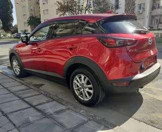 Mazda CX-3 2023 car hire in Cyprus, featuring ✓ Petrol fuel and 145 horsepower ➤ Starting from 39 EUR per day.