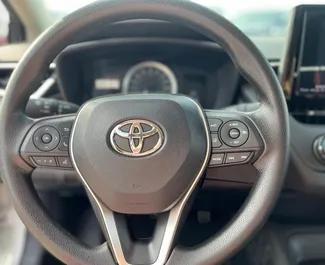 Toyota Corolla Sedan rent. Ökonoomne, Mugavus auto rentimiseks AÜEs ✓ Ilma deposiidita ✓ Kindlustuse valikud: TPL, SCDW, Reisijad, Vargus, Tagatisraha ei ole.