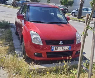 Front view of a rental Suzuki Swift in Durres, Albania ✓ Car #8608. ✓ Manual TM ✓ 0 reviews.